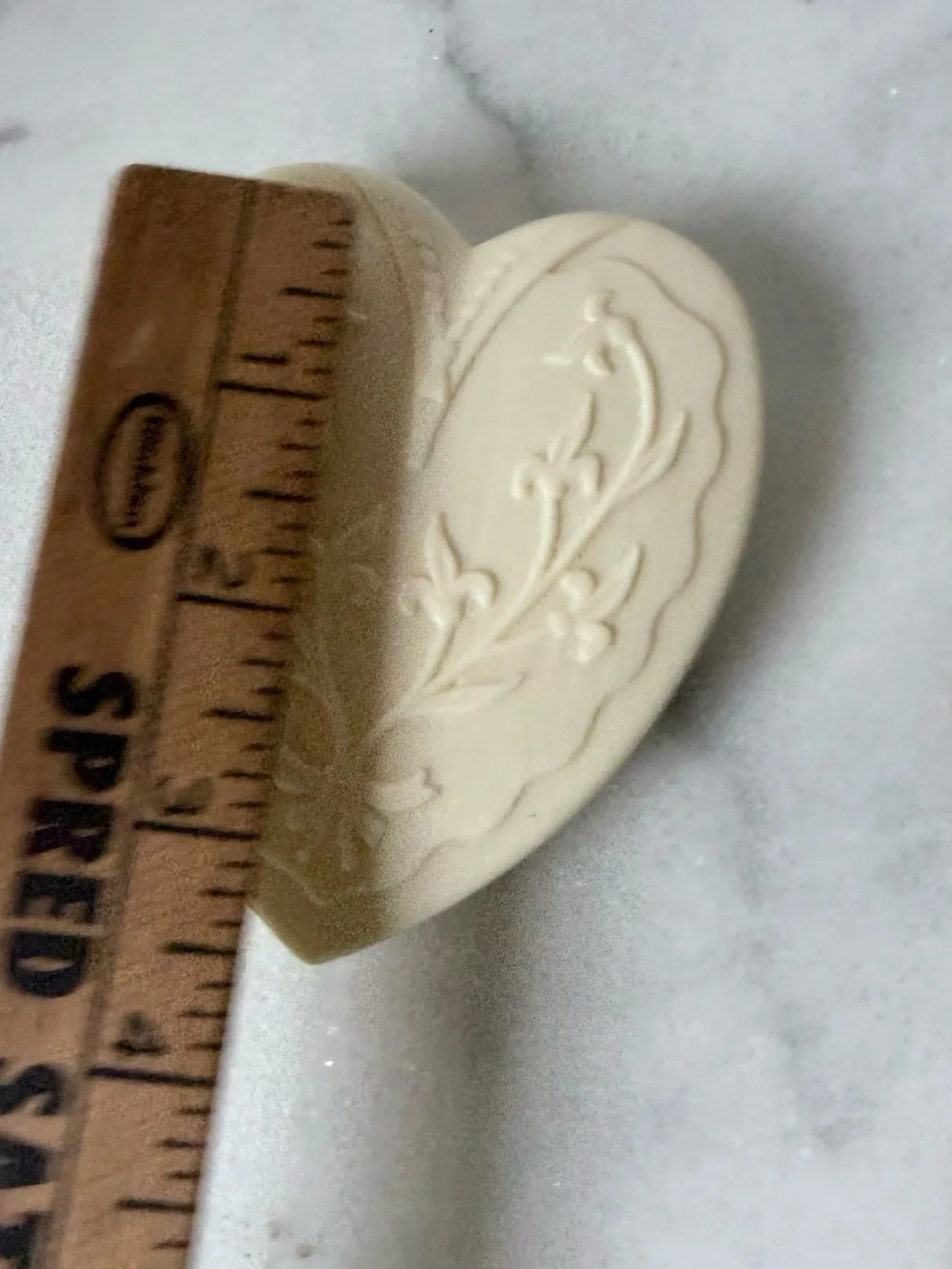 vintage Art Deco-style cream celluloid heart-shaped jewelry box